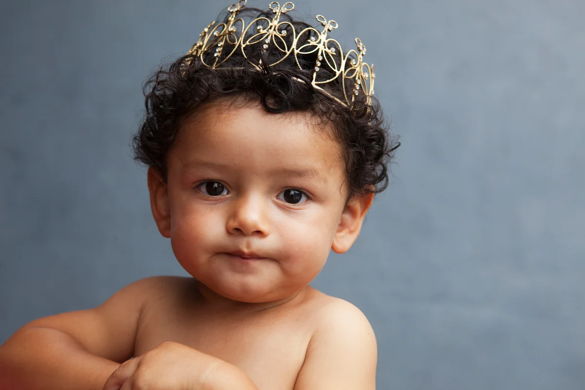 baby boy wearing a crown