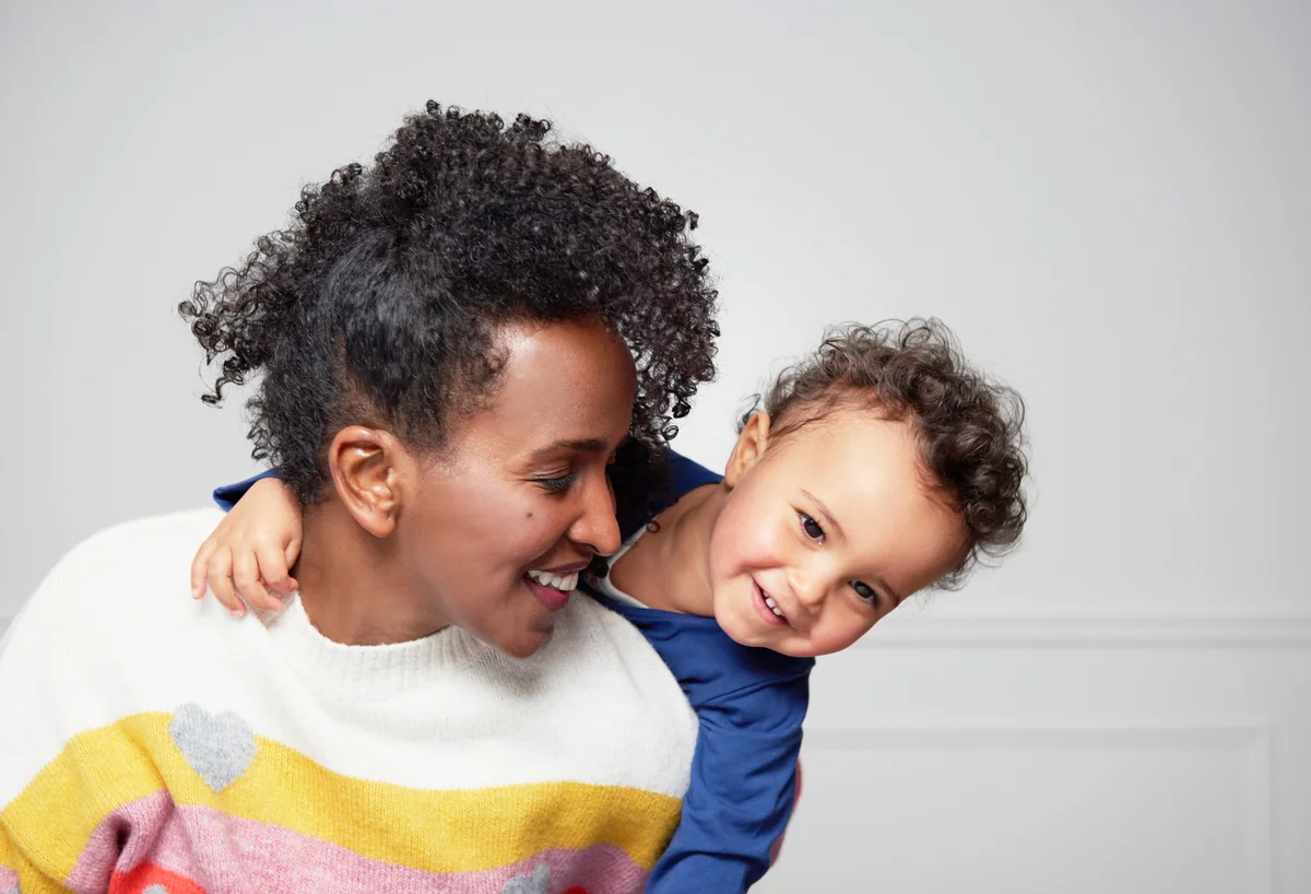 happy mother and toddler