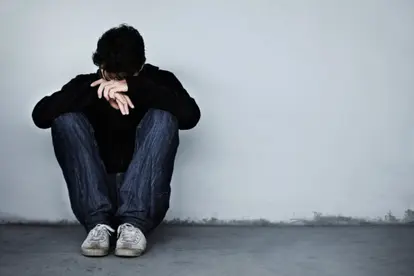 young man looking sad