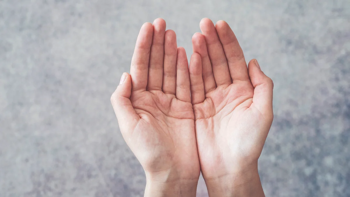 woman with cupped hands