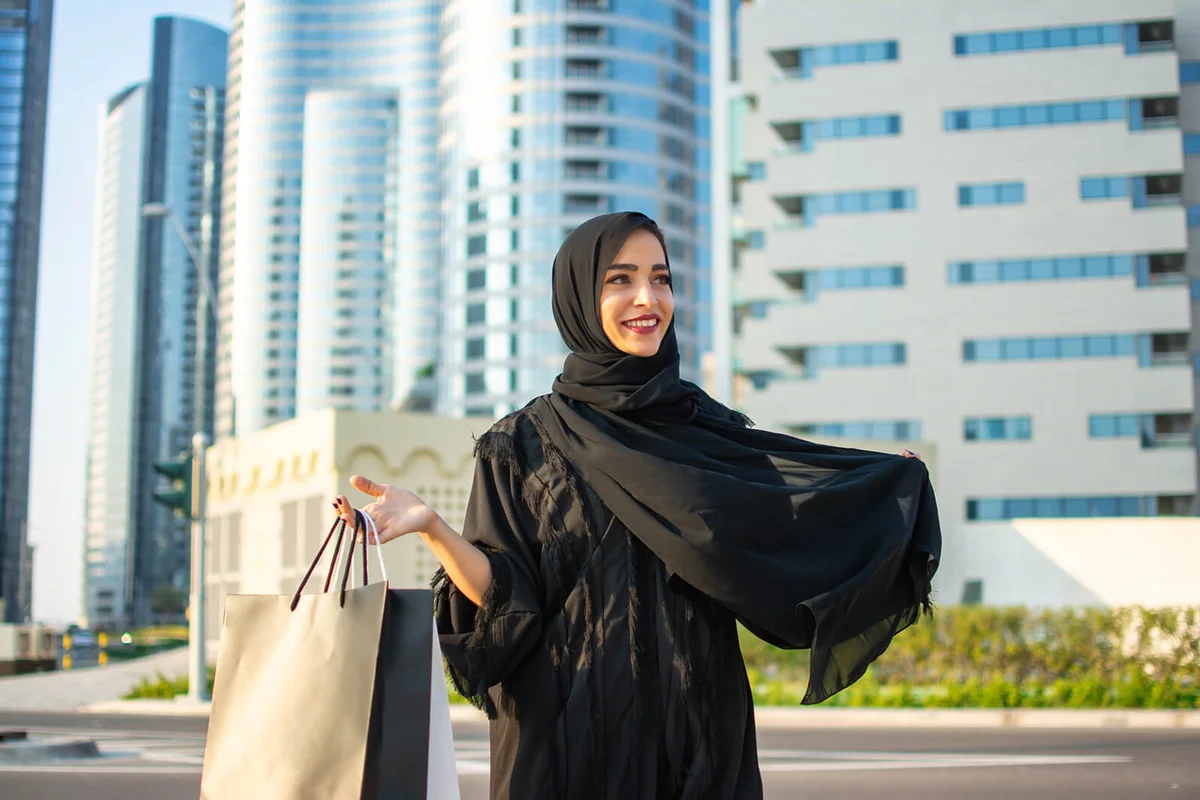 Beautiful young arab muslim woman in abaya clothes
