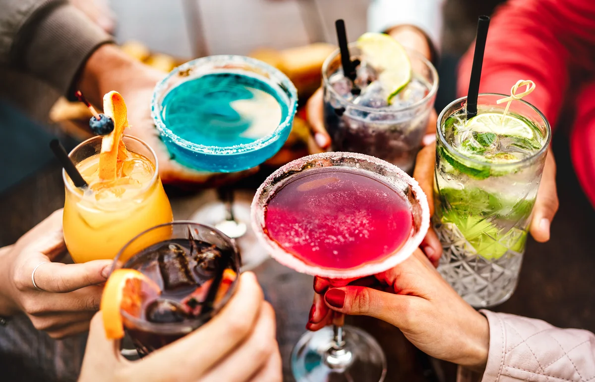 toasting with fancy drinks