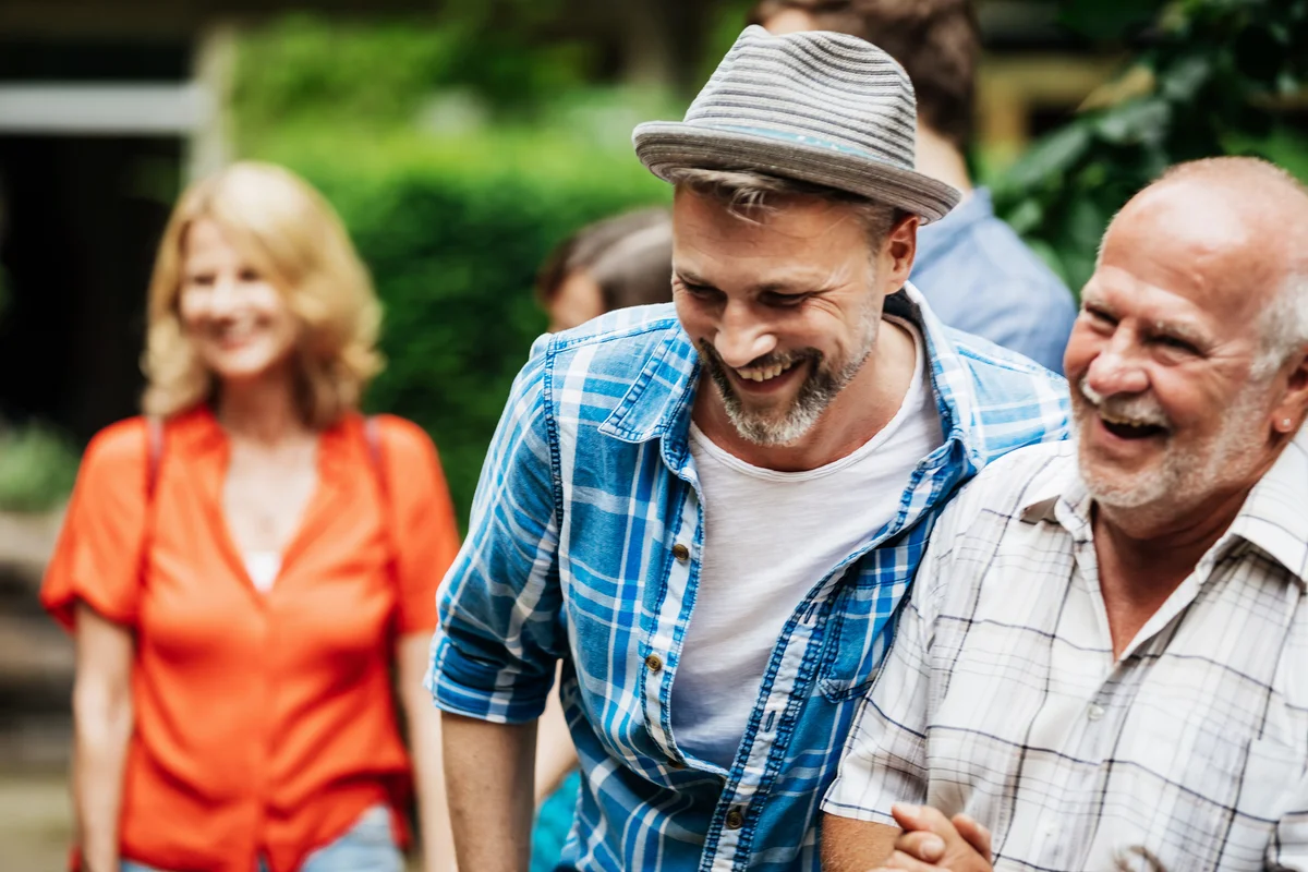 men laughing at a party