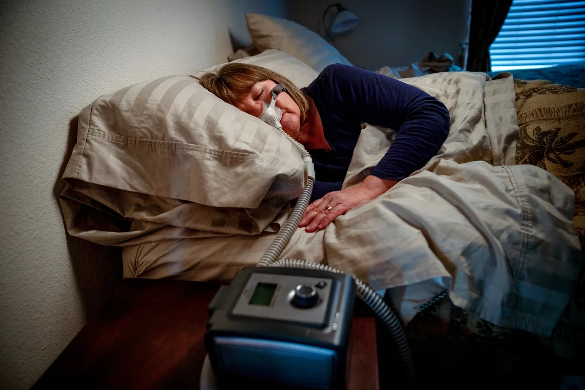 woman sleeping with c-pap