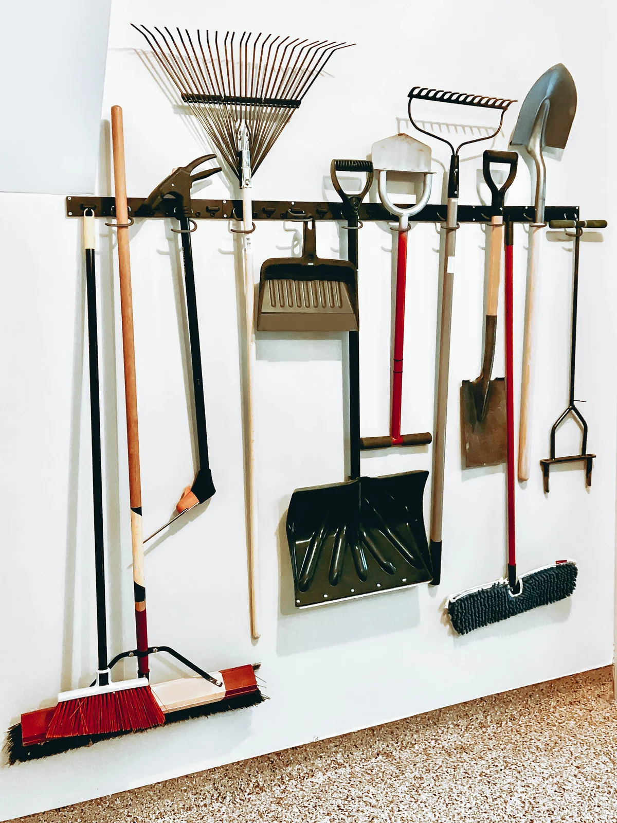 Yard tools hanging in garage