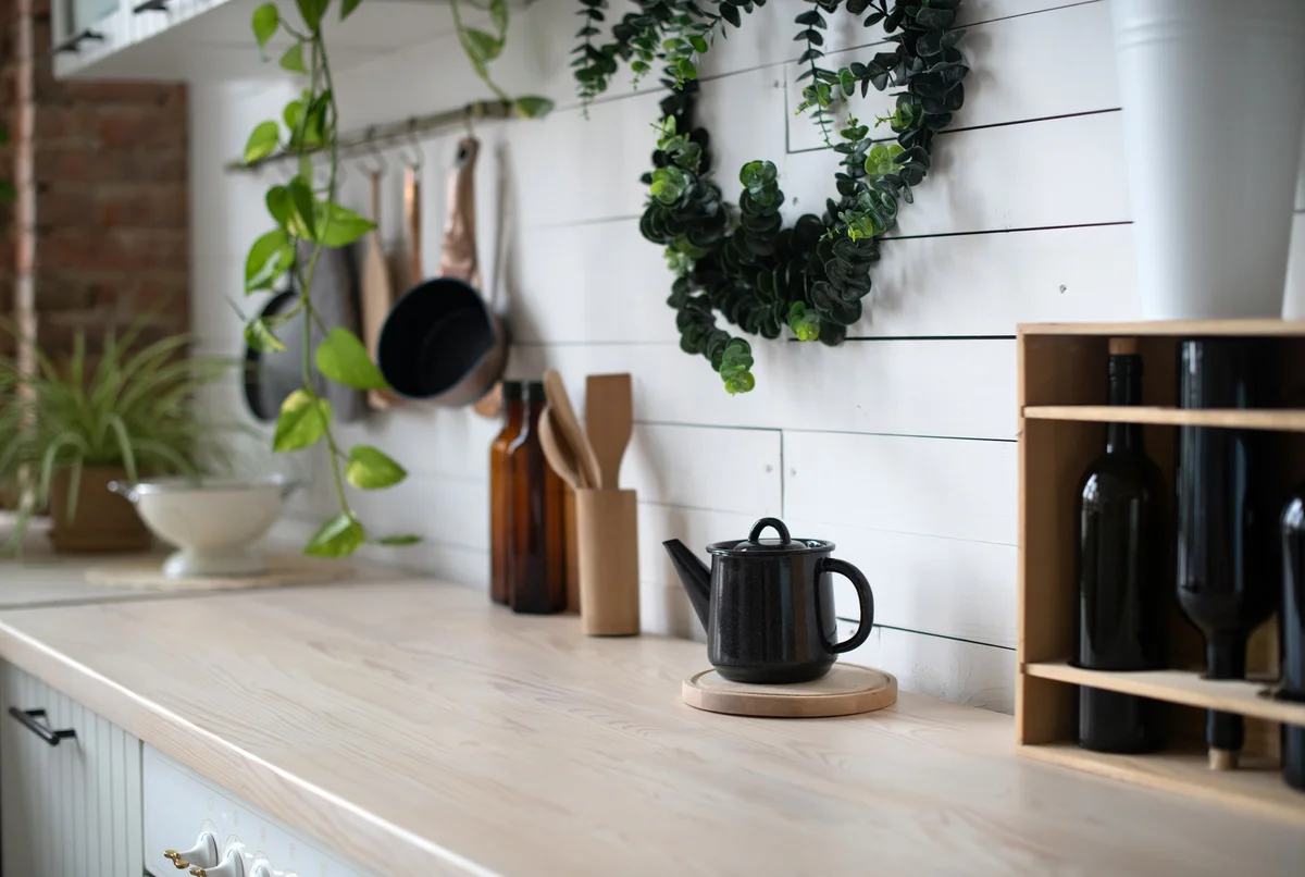 black teapot on a counter