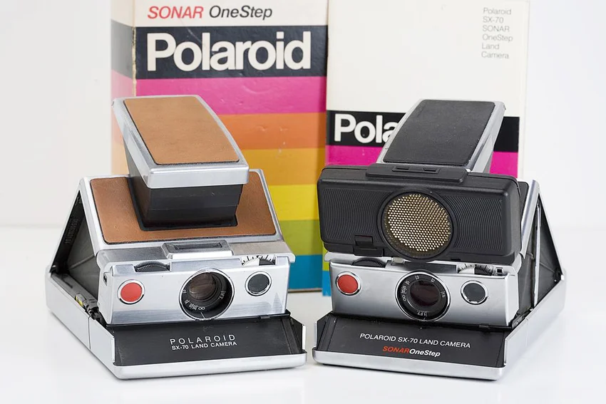 Two American-made Polaroid SX-70 instant Land Cameras
