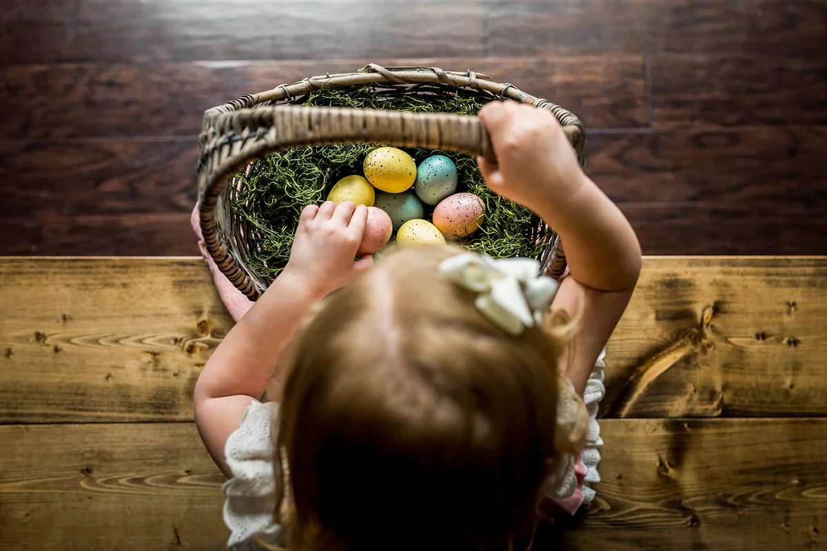 girl with basket of Easter eggs