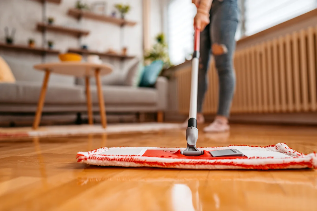 dust mopping the laminate floor