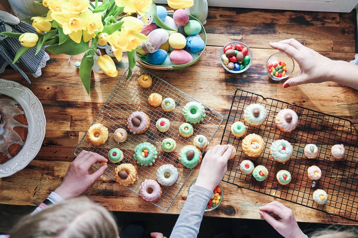 Preparing Small Easter Bunt Cakes with Icing