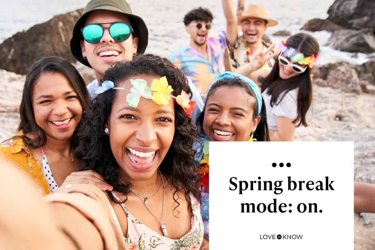 Happy selfie of colleagues having fun at a beach party