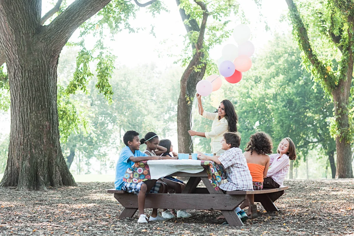 Outdoor birthday party with balloons