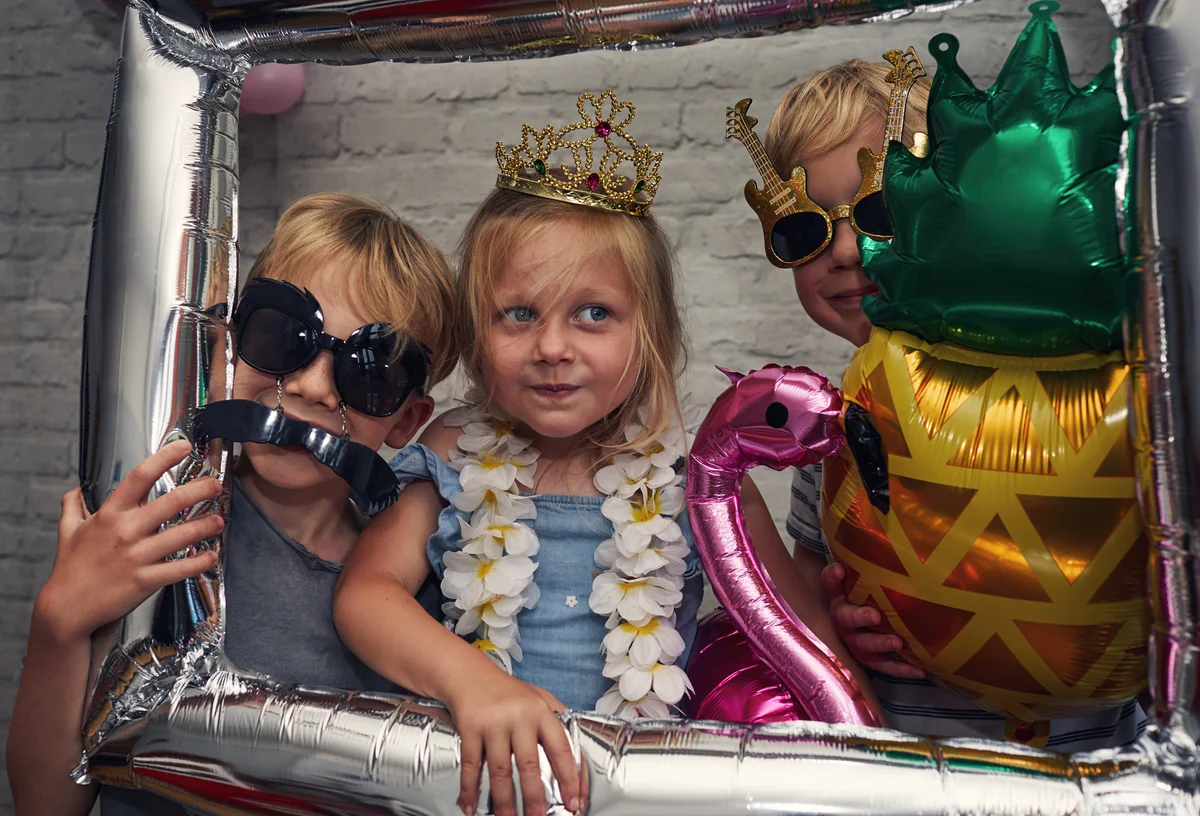 kids in a photo booth