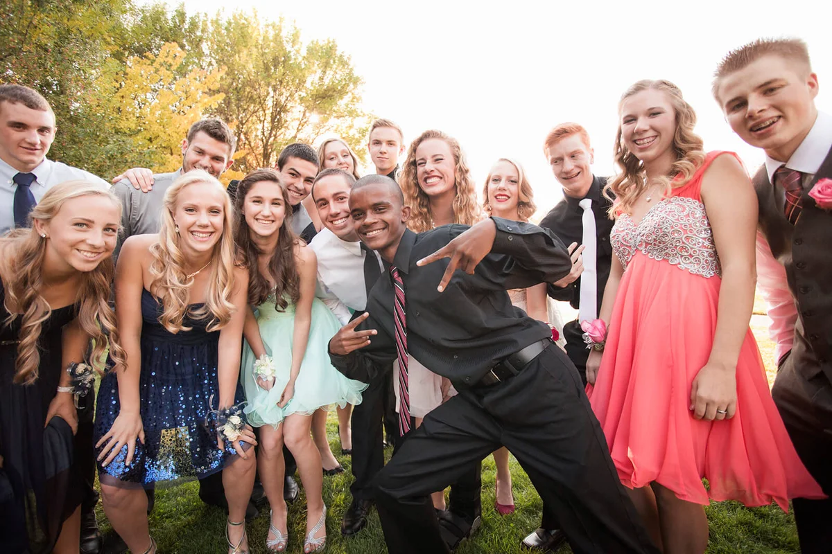 Teenagers smiling before prom