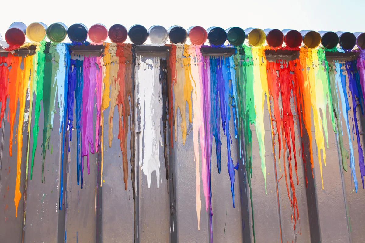 Many colors splash dripping on wall
