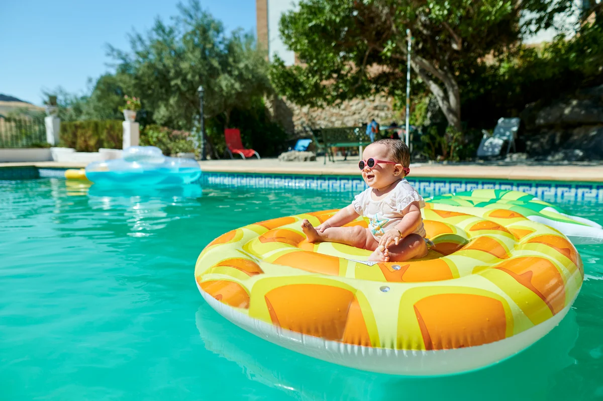 baby in pool float