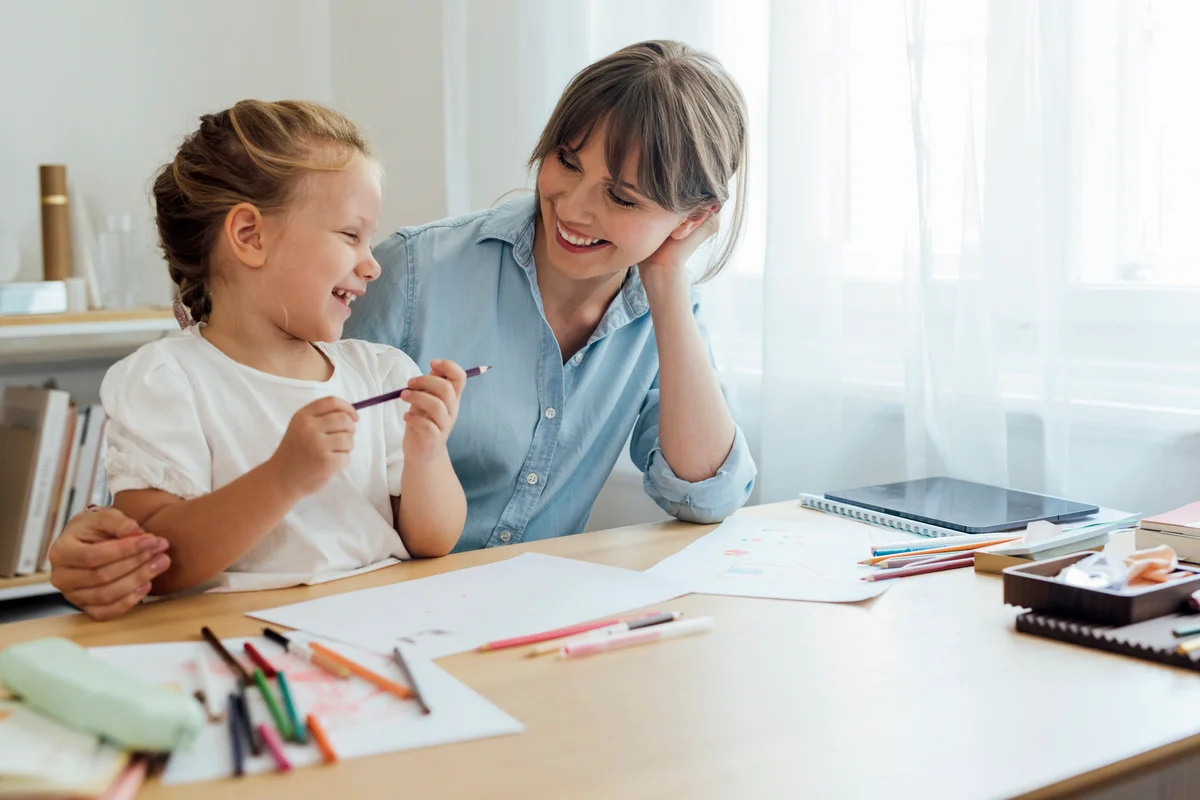 Blonde girl and Babysitter drawing