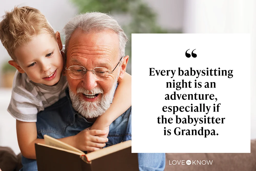 Grandfather and grandson reading book together