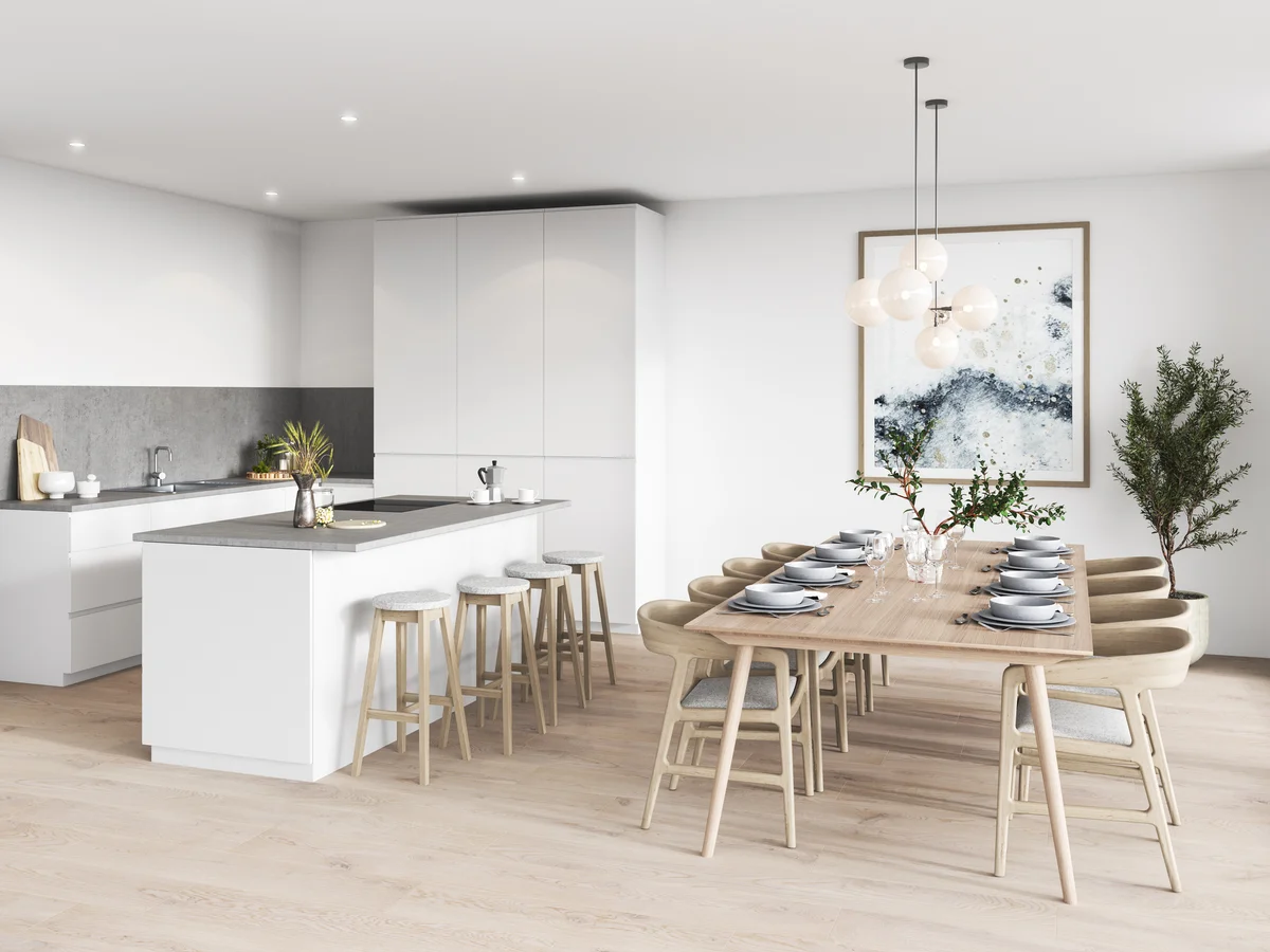 Kitchen and dining area decorated with light wood tones
