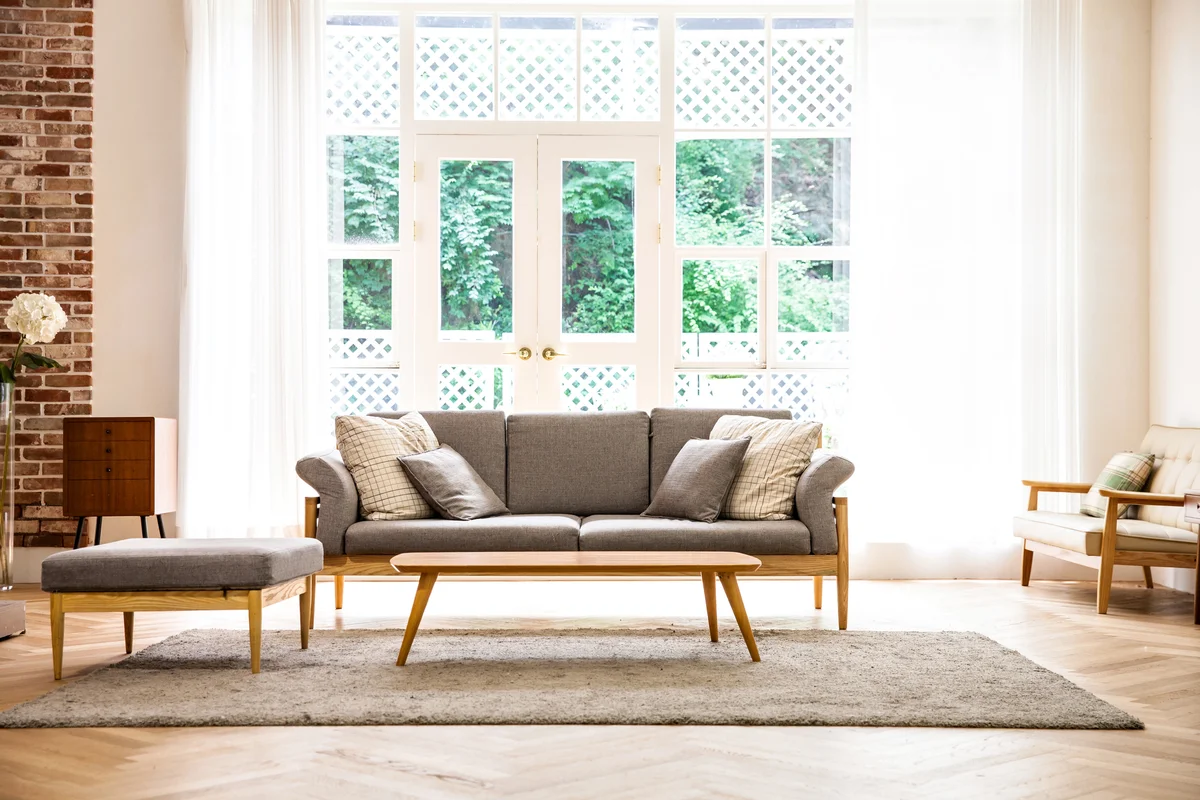 Cozy living space with exposed brick and warm tones