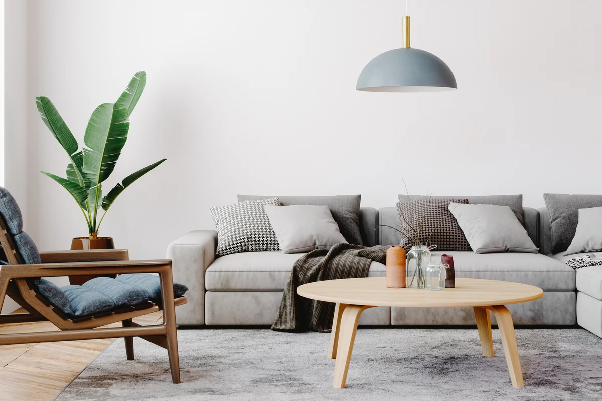 Modern living room with pretty blue light fixture