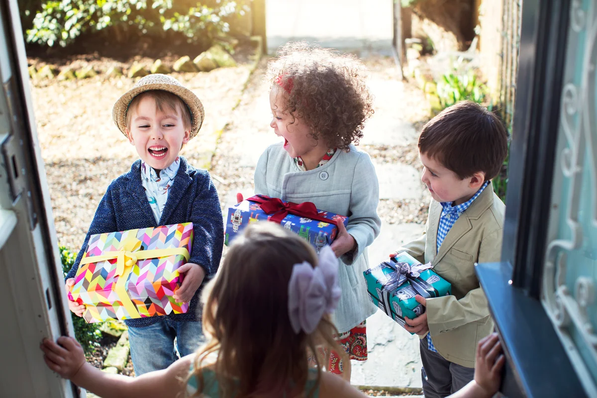 kids at party  with gifts
