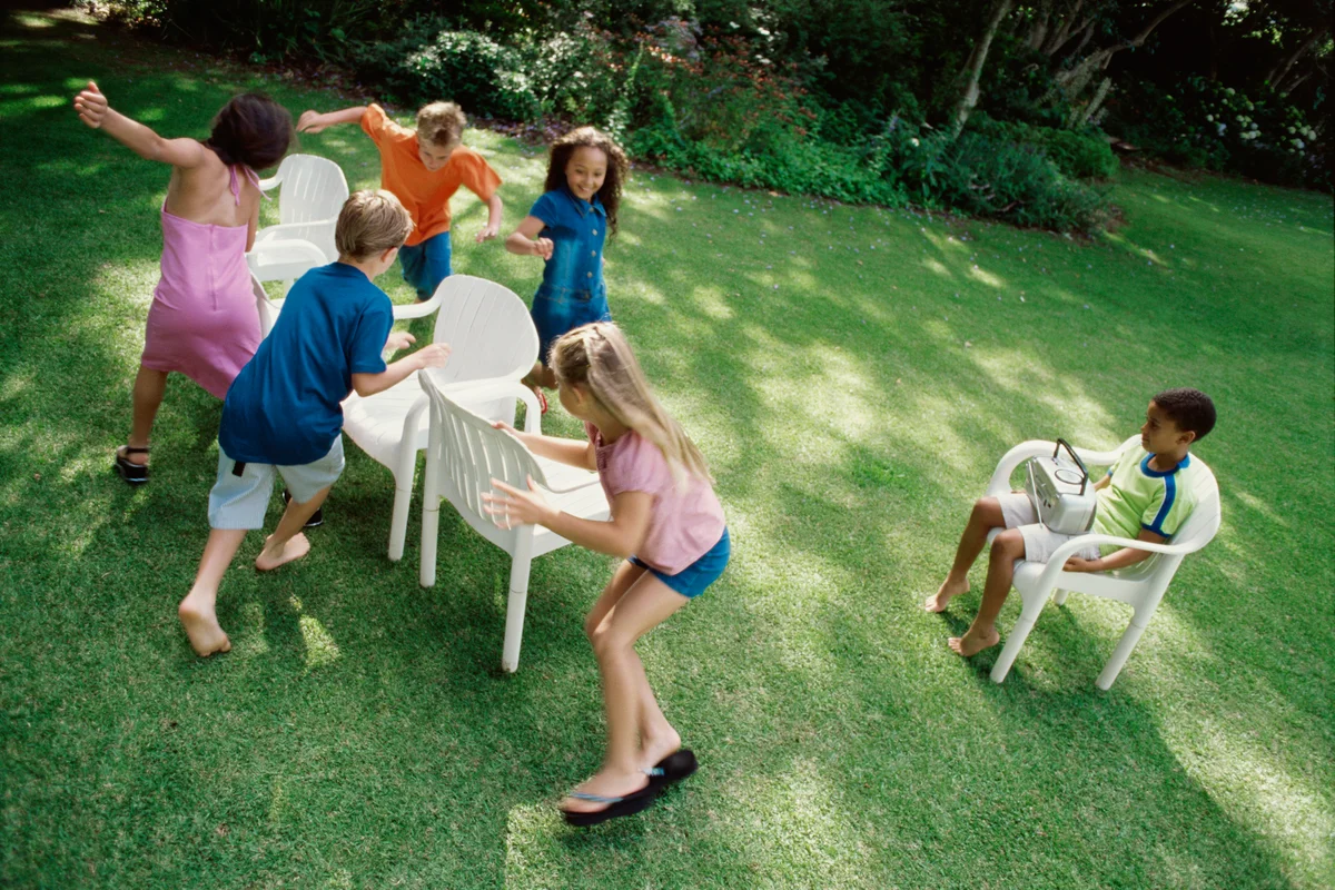 Children playing musical chairs