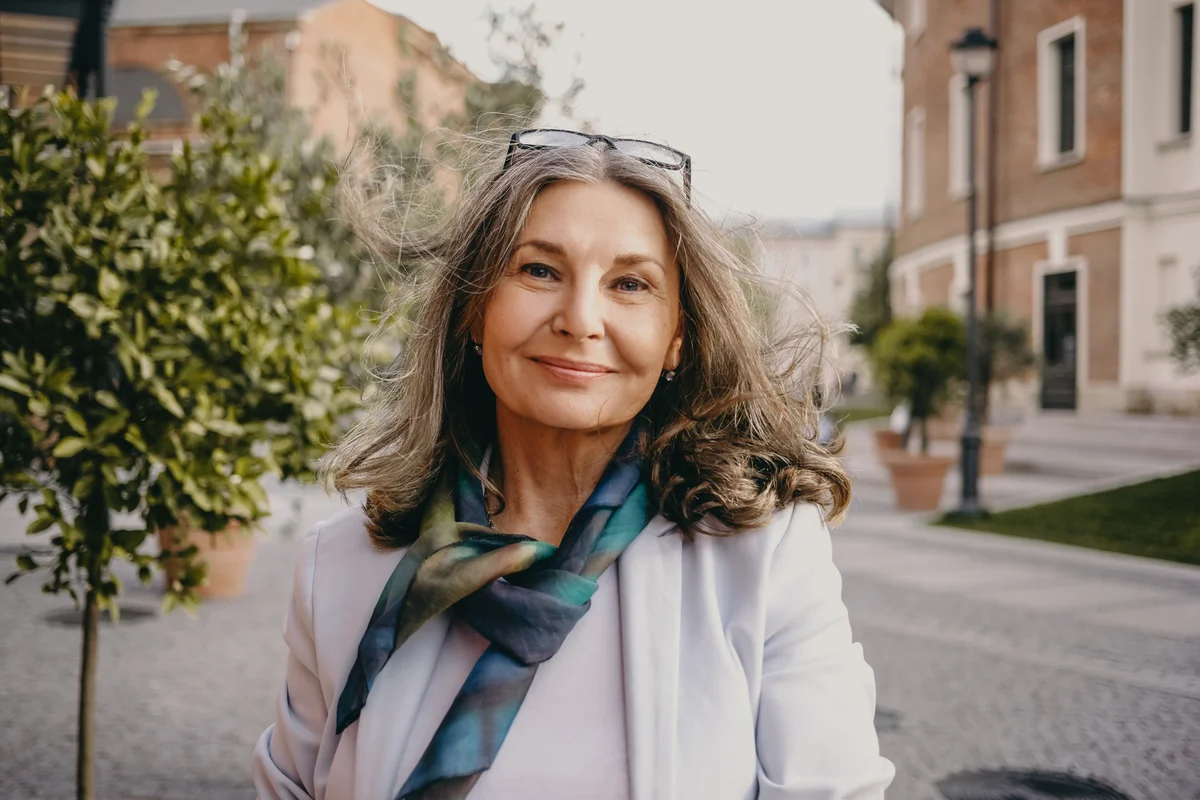 Happy senior woman with beautiful hair