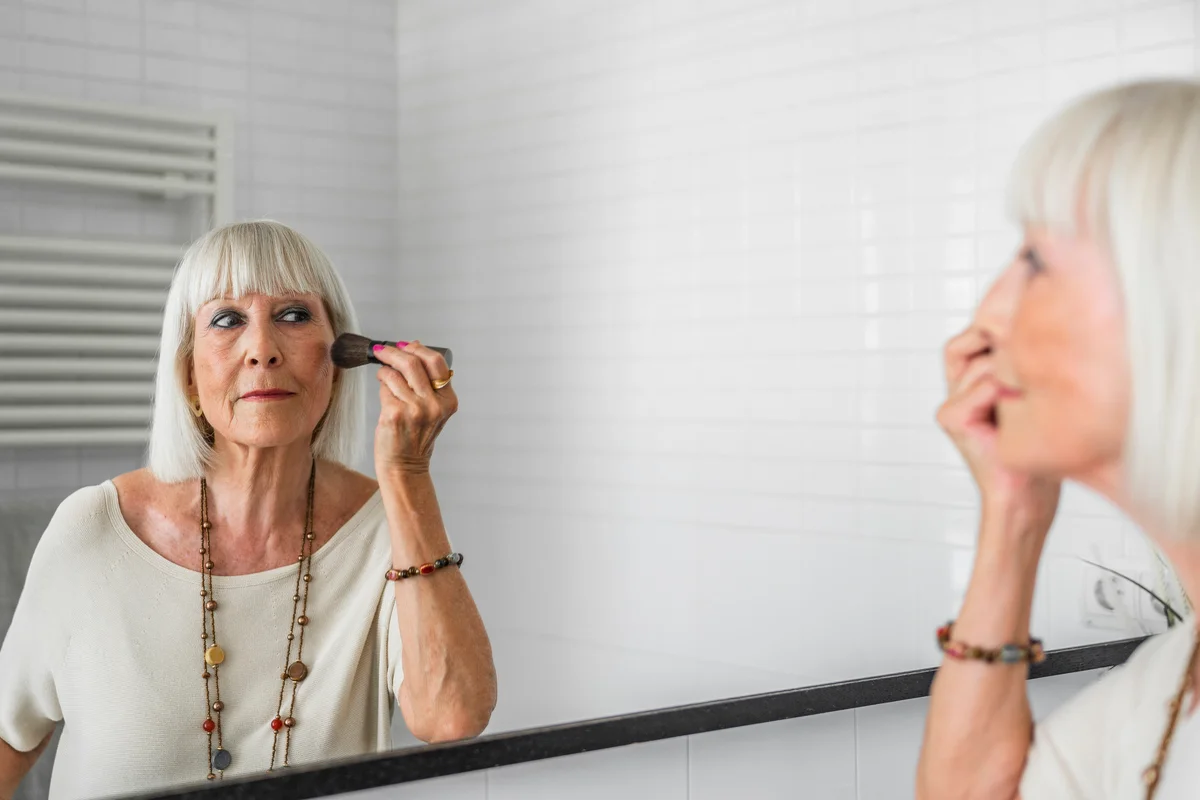Beautiful senior woman with white hair and sharp edgy bangs