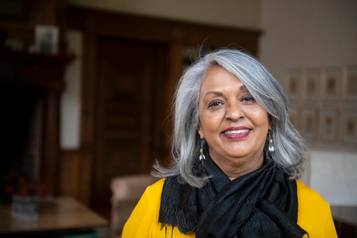 Beautiful senior woman with medium length grey layered hair