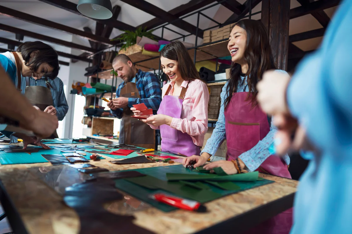 Group of friends crafting at table