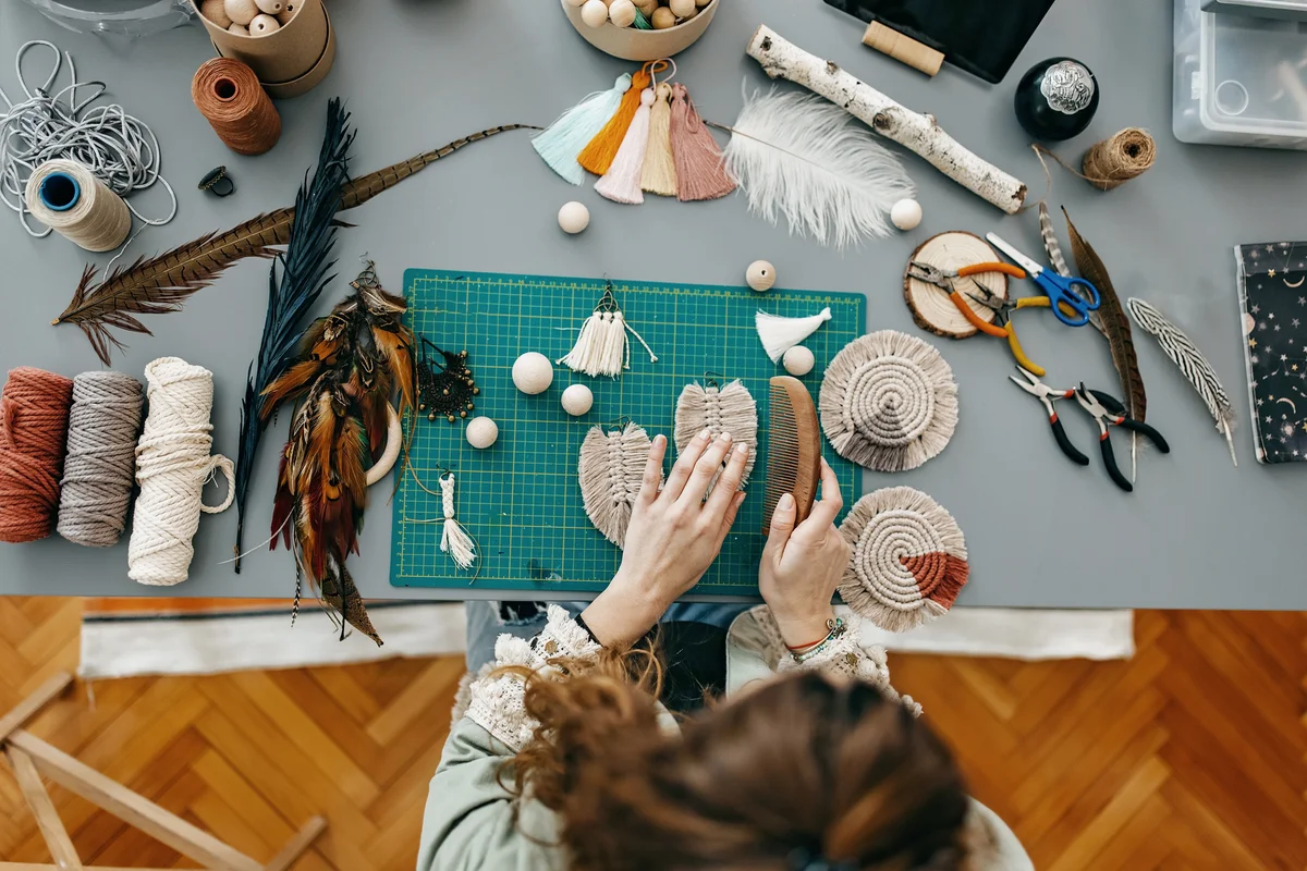 woman making jewelry