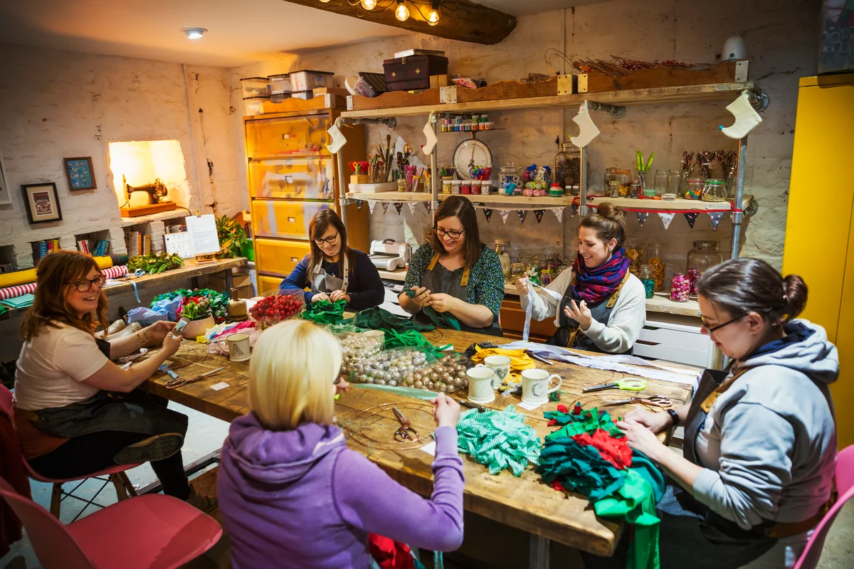 Group of women doing Christmas crafts