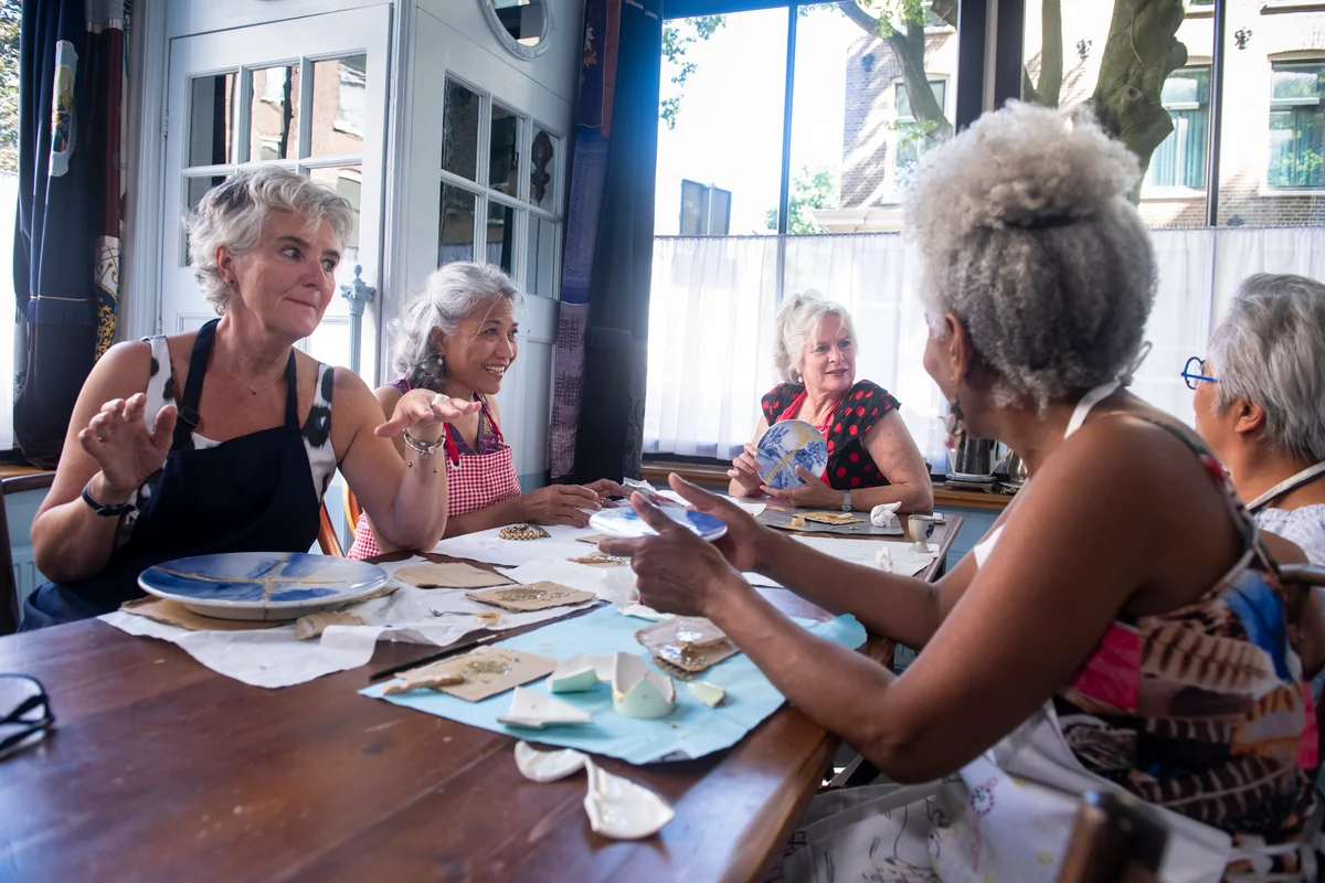 Senior friends crafting together