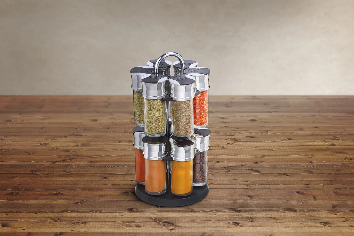 Spice rack with bunch of different spices on it