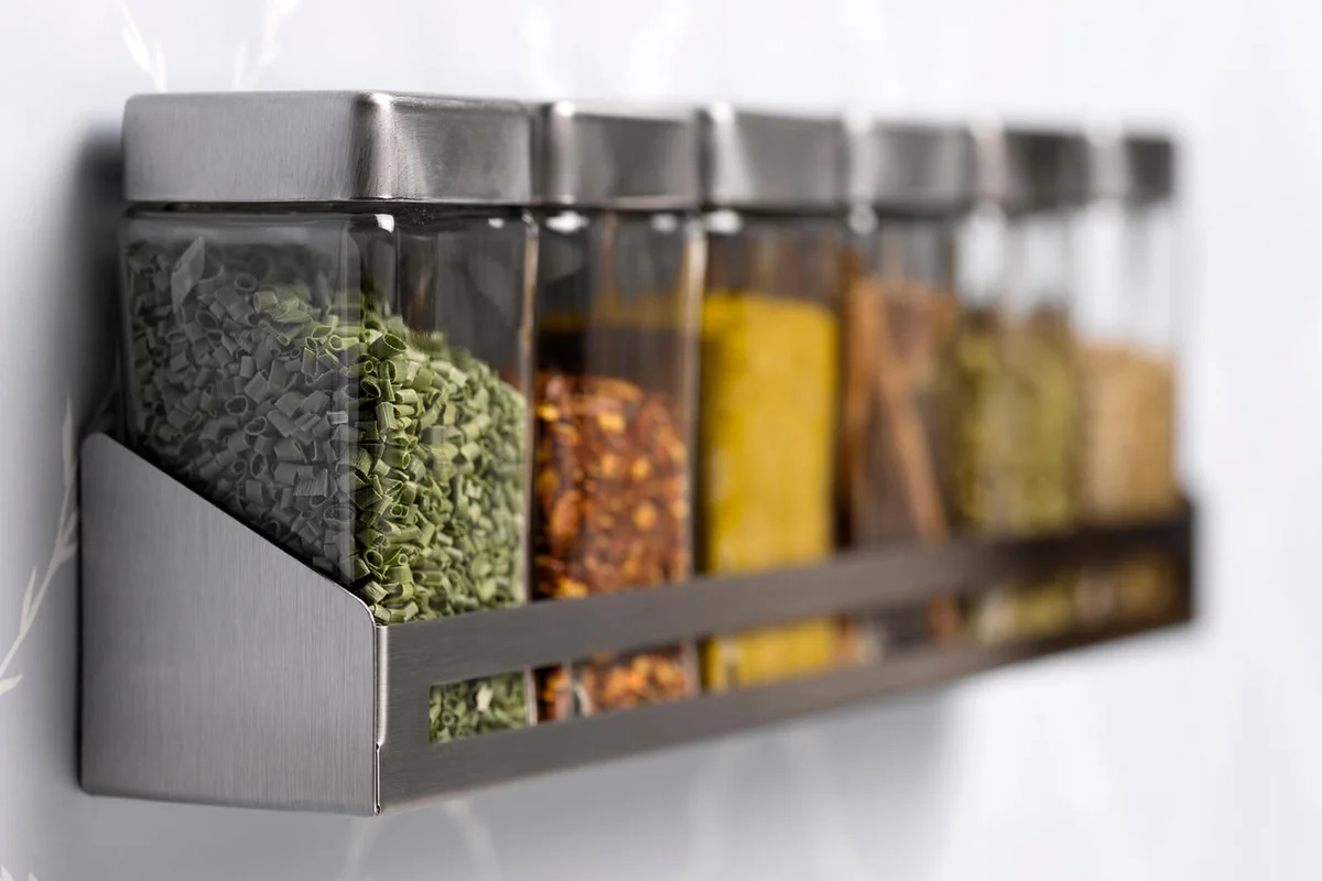 Spice rack hanging on wall