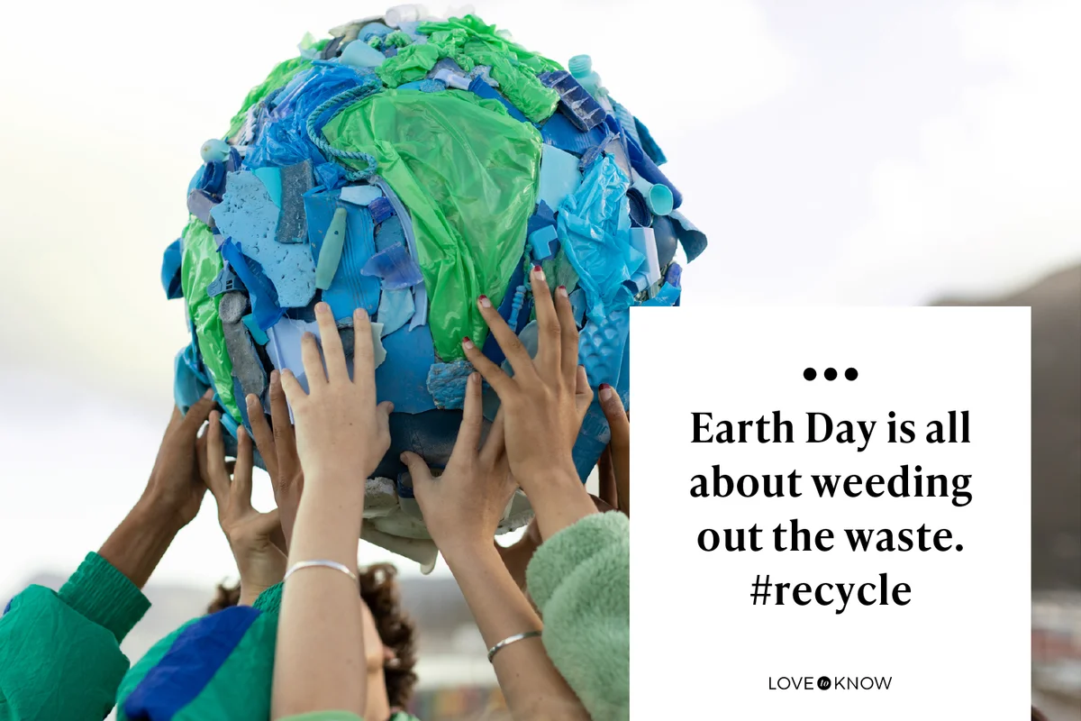 Group of teenagers holding up a world made of plastic trash