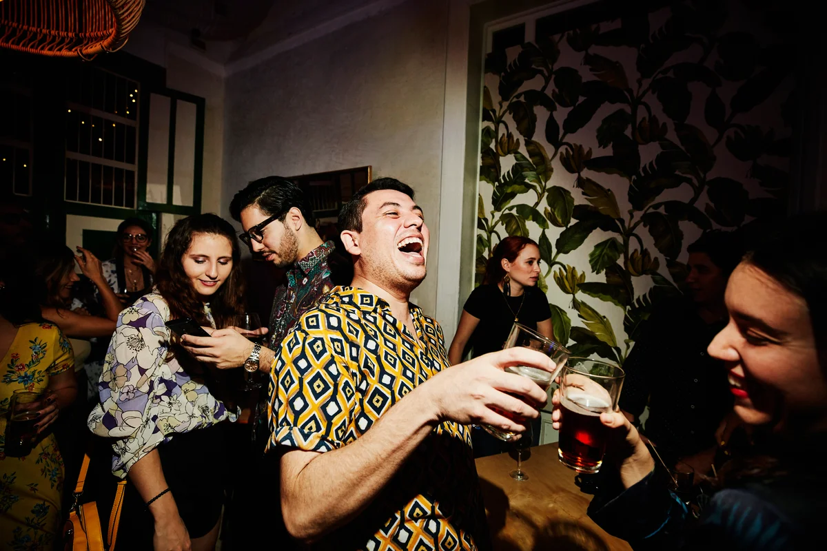 people laughing at a party
