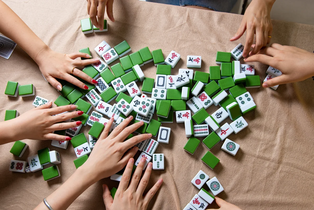 group playing mahjong game