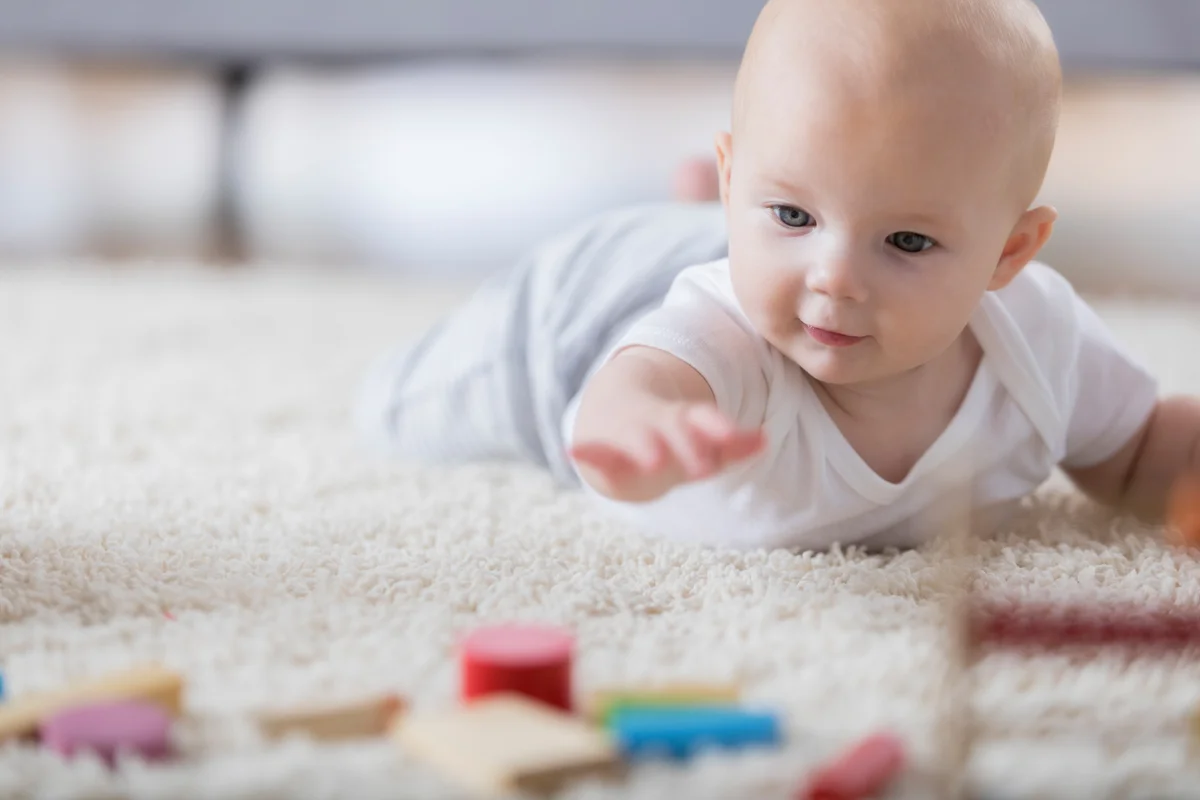 Cute baby enjoying tummy time