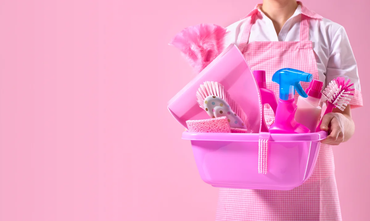 woman with cleaning supplies