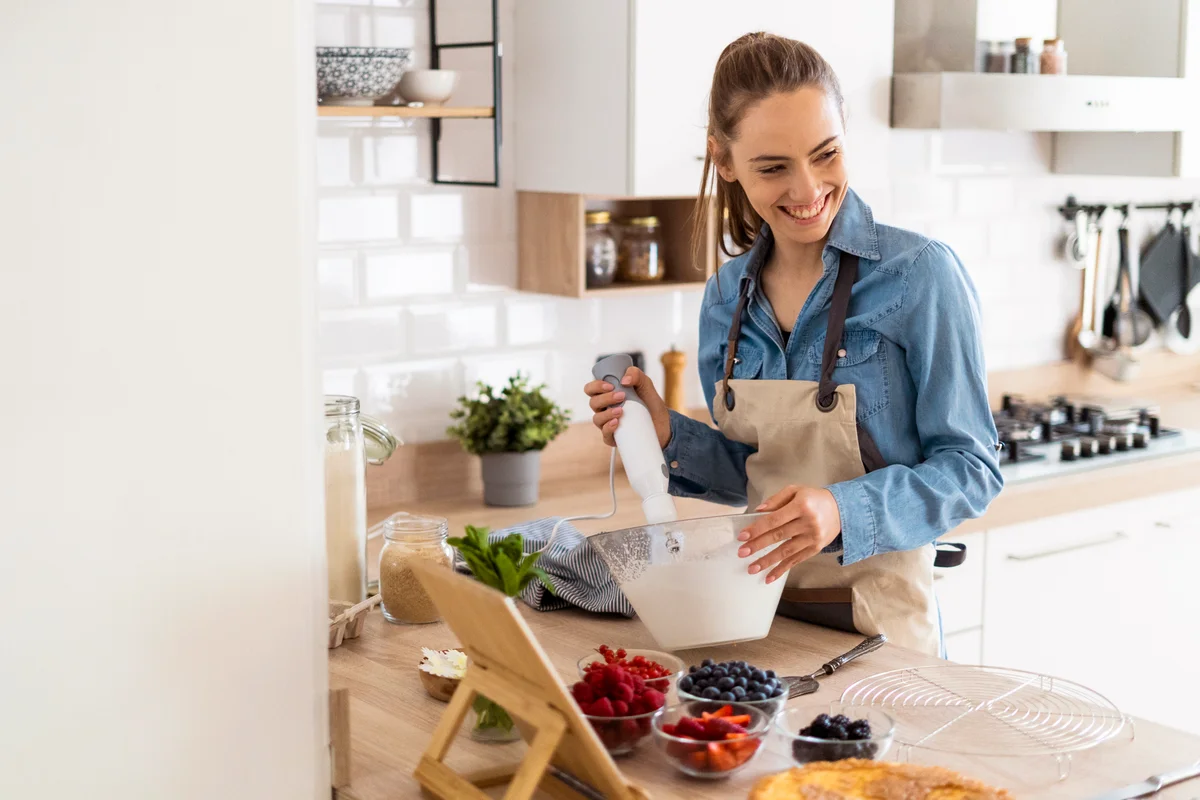 Young woman baking in her kitchen