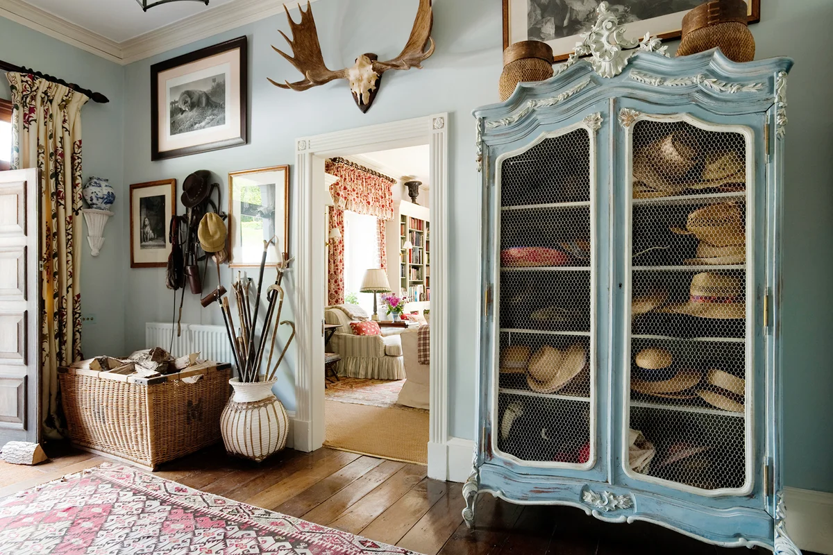 Country Estate entrance hallway with hat storage and walking sticks