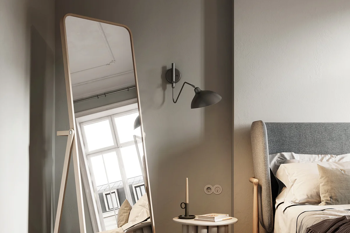 Large mirror in the corner of bedroom