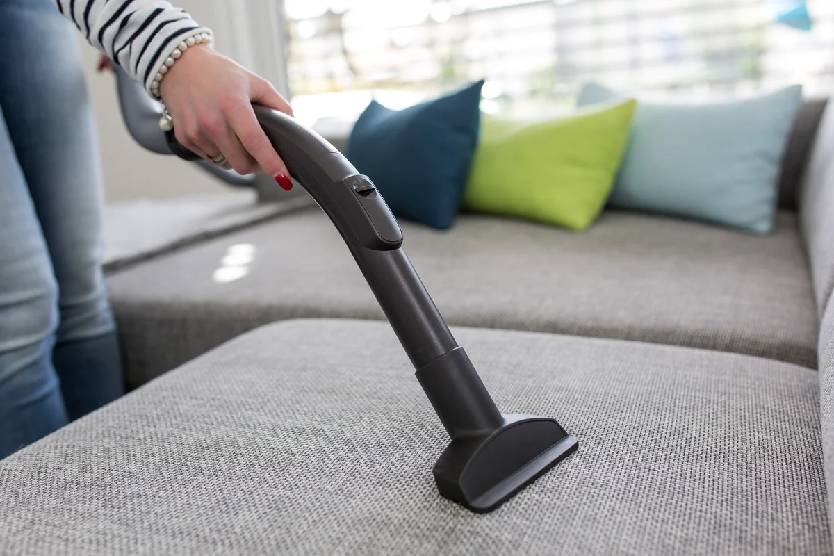 vacuuming the couch