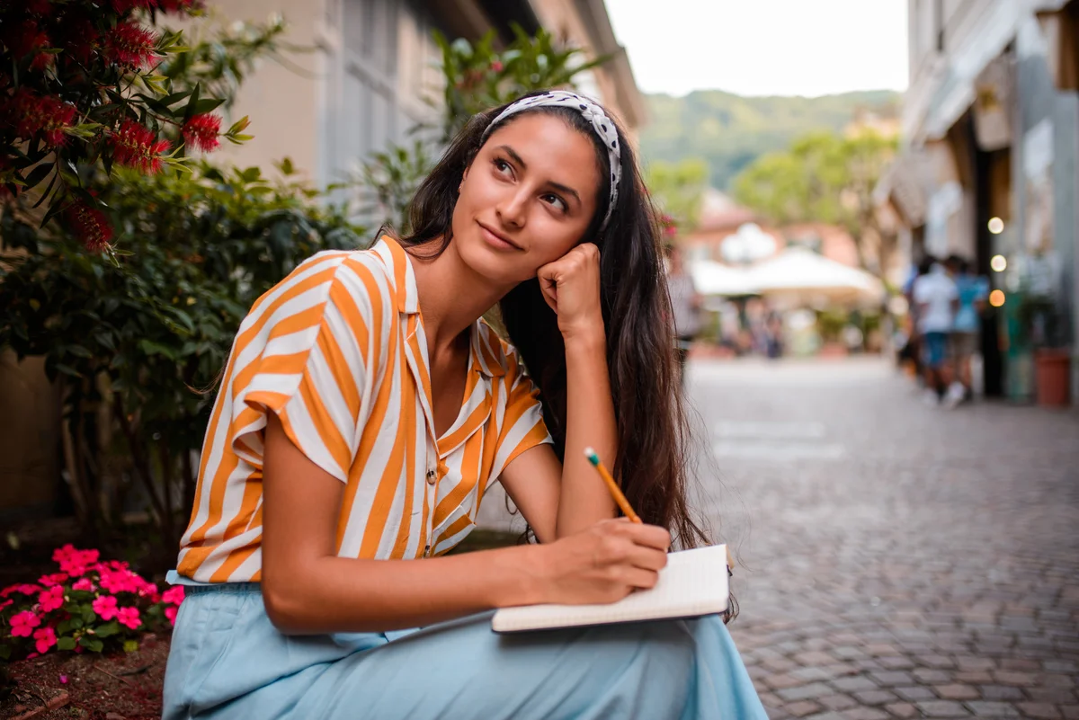 You woman writing letter