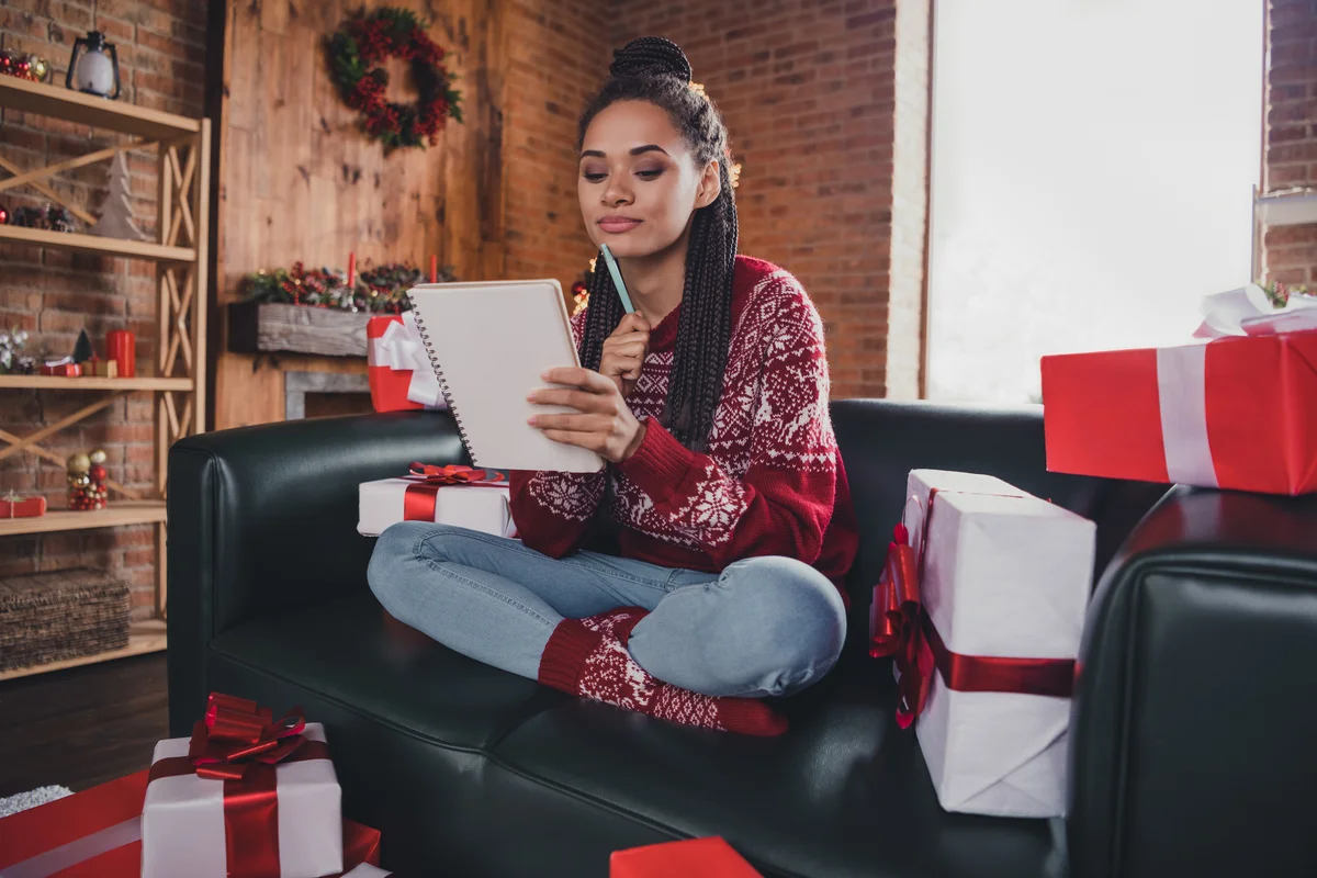 Woman writing holiday letter