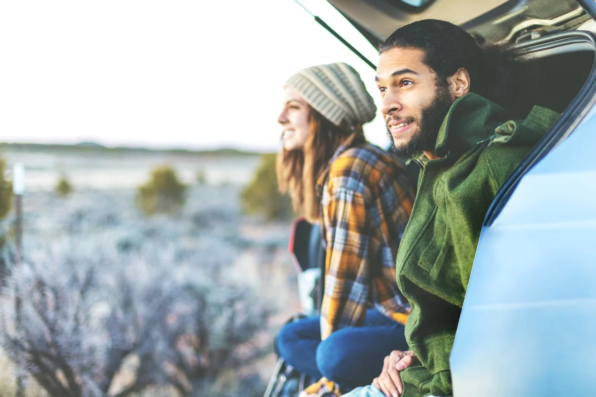 Colorado couple sitting in back of car