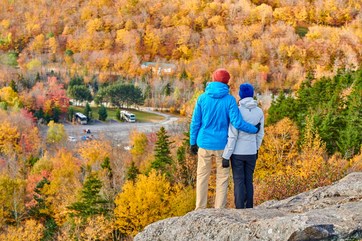 Couple enjoy beautiful New Hampshire fall scenery