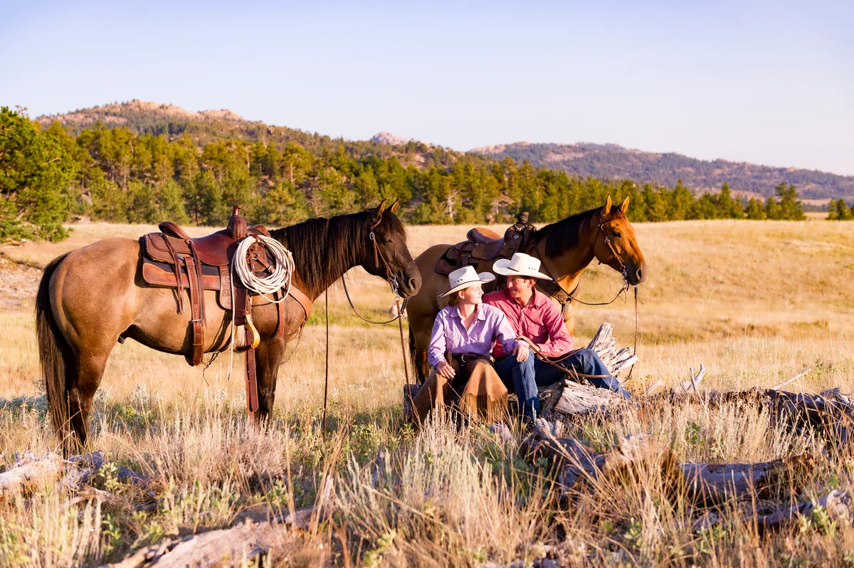 Wyoming couple relaxing with their horses